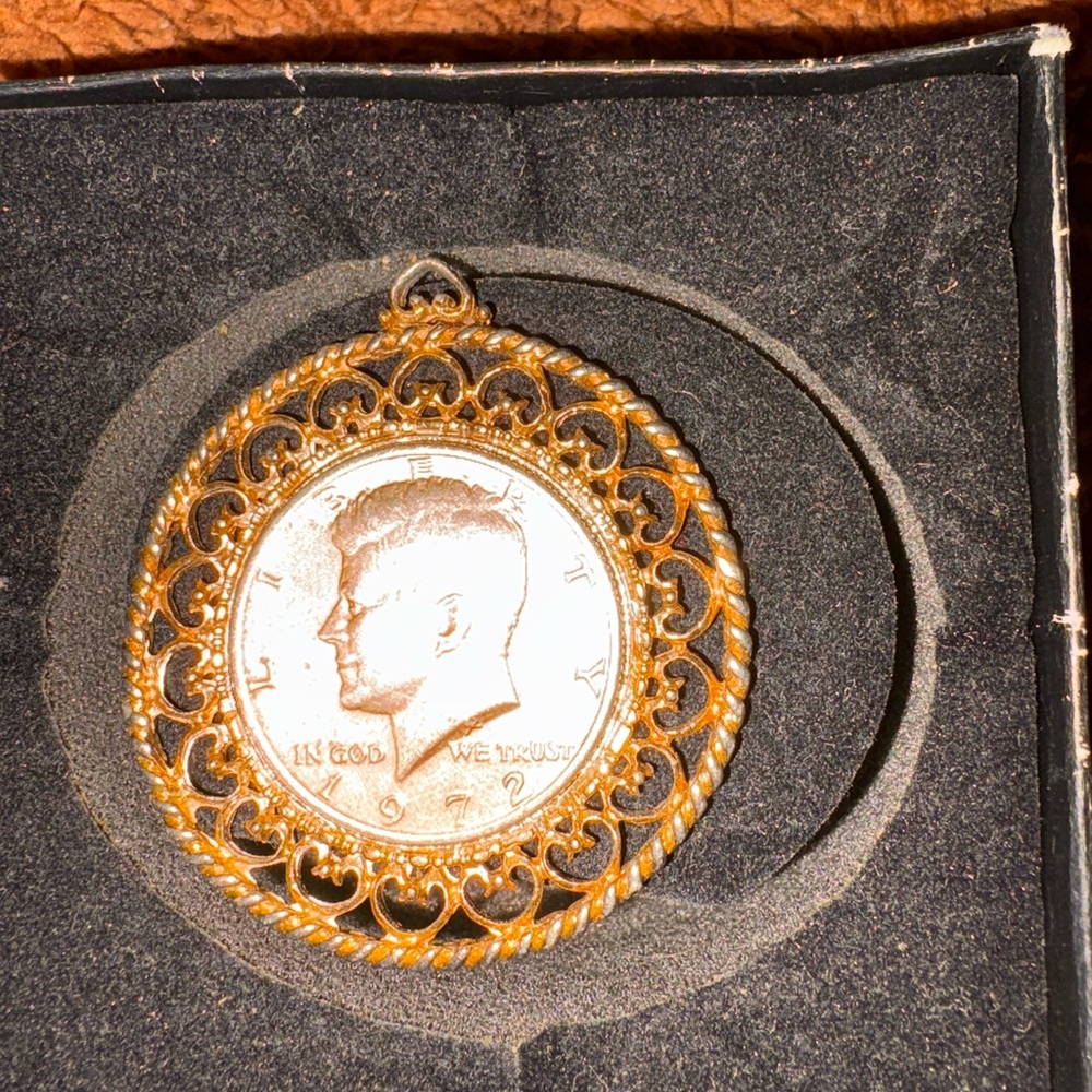 JFK Gold Coin pendant.